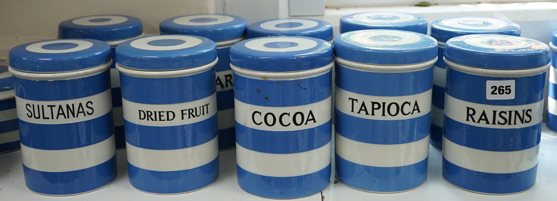 T.G.Green Cornish Kitchenware, ten 17cm lidded storage jars to include Tapioca, Dried Fruit, Sultanas, Lump Sugar and Flour, Black Shield marks. Condition - fair to good